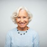 An age-gifted woman with a beautiful smile.